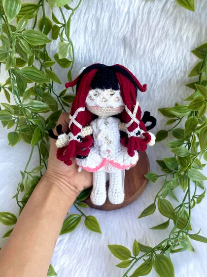 This is Columbina Damselette, a beautifully detailed anime character. The intricate hairstyle with red and black locks and the delicate white dress was a challenge I truly enjoyed creating.