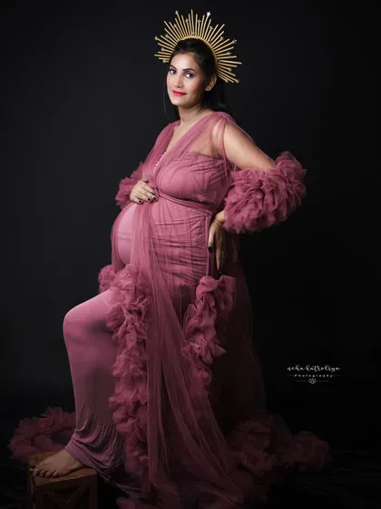 Feel like a queen for a day. With dramatic gowns and regal accessories like this sunburst headpiece, I can create powerful and artistic portraits that celebrate your strength.