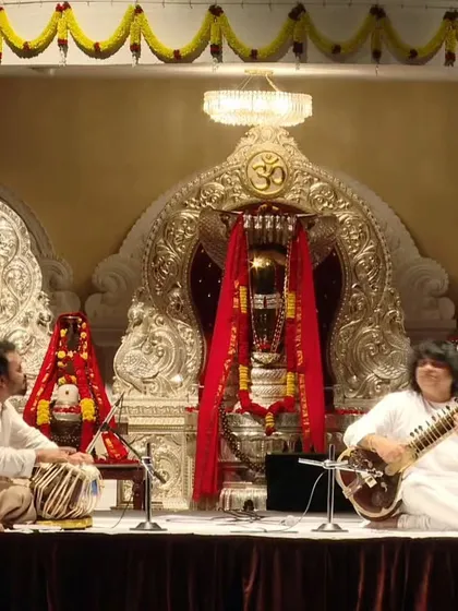 A collection of images from various concerts with the one and only Pandit Niladri Kumar ji. Whether on the sitar or his Zitar, every concert with him is a masterclass in creativity.