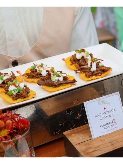 Our signature Korean Pulled BBQ Pork appetizer, showcasing a fusion of international flavours presented in a modern style.