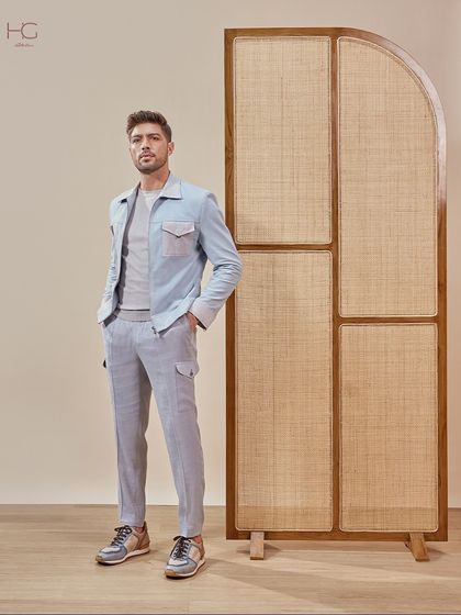 Another angle of the sharp light blue shacket, showing its versatility and modern fit. It's an essential for any stylish, contemporary wardrobe.
