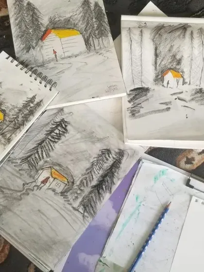 A series of studies exploring the same subject: a cabin in the woods. This shows how students can experiment with composition and mood using simple pencil and charcoal techniques.