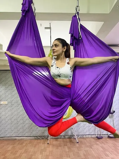 Find your power and defy your limits with us. Aerial yoga is a journey of empowerment, helping you build physical strength and mental resilience. Here, we use the silk hammock to explore poses that make you feel strong, graceful, and free.