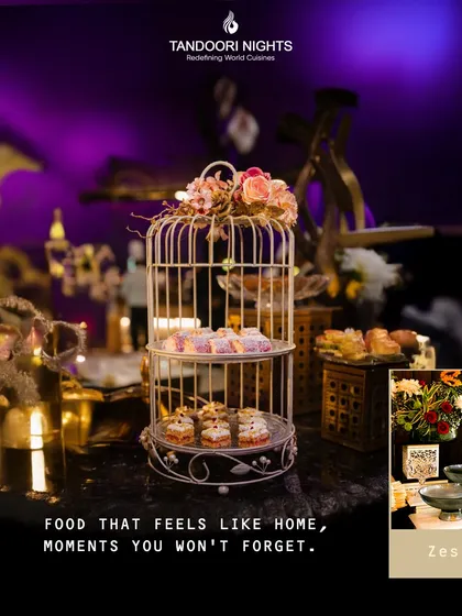 We create food that feels like home and moments you won't forget. This dessert station, with its elegant birdcage display and ambient purple lighting, adds a touch of magic to any event.