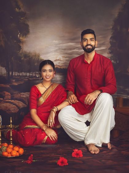 A classic, formal portrait of the couple in their traditional Maharashtrian attire. Their proud and happy expressions make this a wonderful family heirloom.