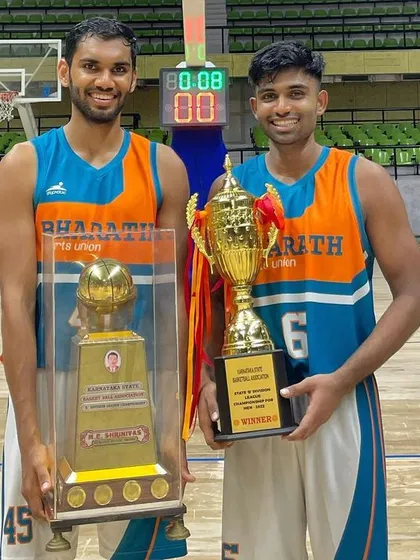 Success is earned. Here I am with a teammate after winning the KSBBA State B Division League Championship. I train my clients with the same championship mindset that I bring to my own games.