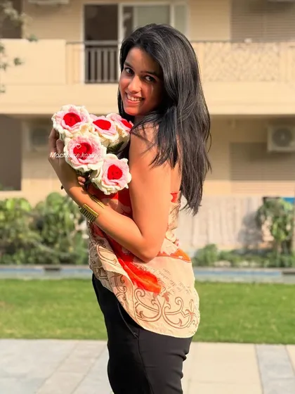 A smiling shot with our beautiful handmade crochet rose bouquet. These make for wonderful photo props and even better gifts.