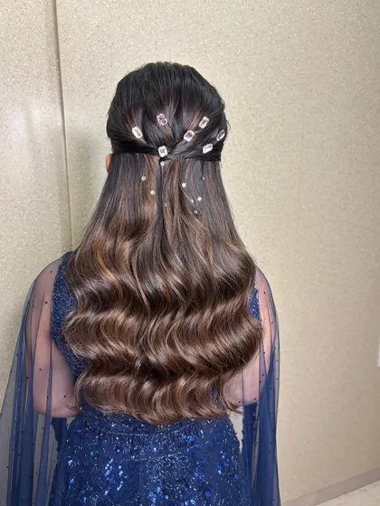A detailed view of the jeweled hairstyle for this sangeet look. I added crystal accents to her soft, voluminous waves for that extra touch of sparkle and elegance.