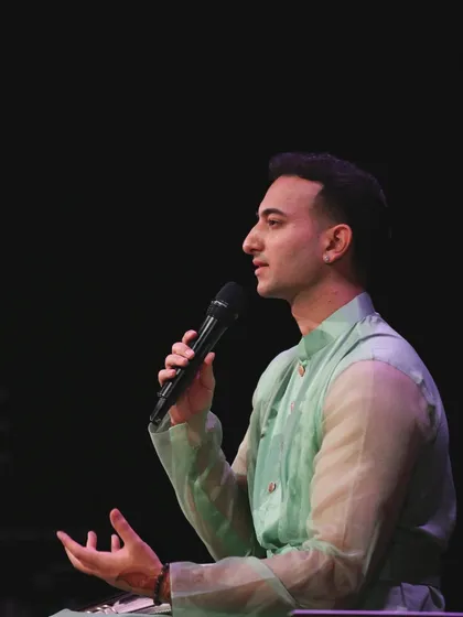Speaking to the London audience. I always take time to connect with them, share stories, and listen to their experiences.