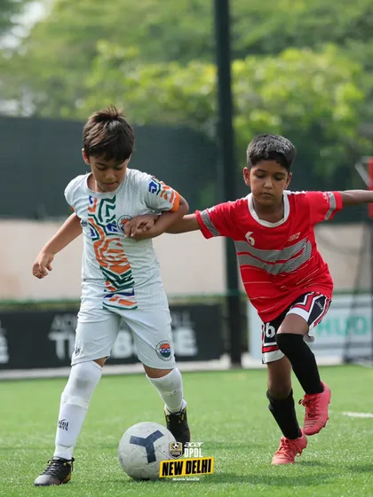 A physical duel for possession. Our training builds the strength and resilience needed to win these crucial battles on the field.