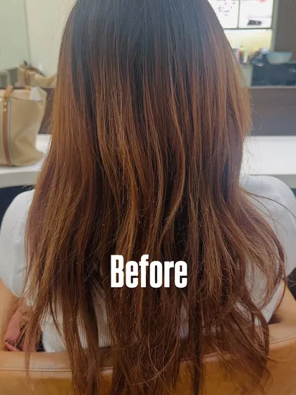 A 'before' image showing hair with a previous reddish color. This was the canvas for a gorgeous new brunette transformation.