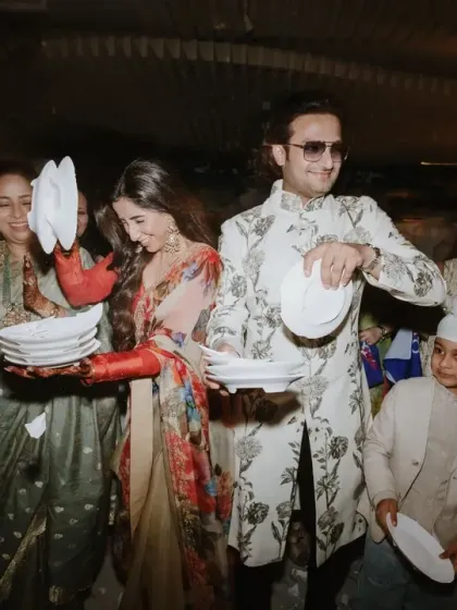 The couple participates in the iconic Greek plate-smashing ritual. I love designing events that are not only beautiful but also fun and engaging for the couple and their guests.