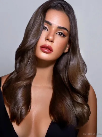 Skin, hair, absolute perfection. This beauty shot is ideal for a hair or makeup brand, showcasing flawless execution by the entire creative team.