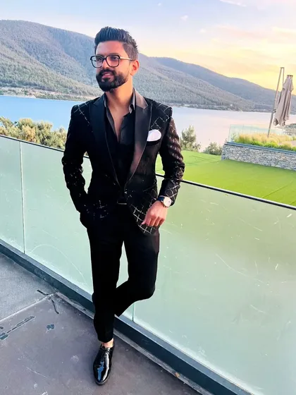 A stunning view of Bodrum in the background, complementing my sharp, all-black sangeet outfit.