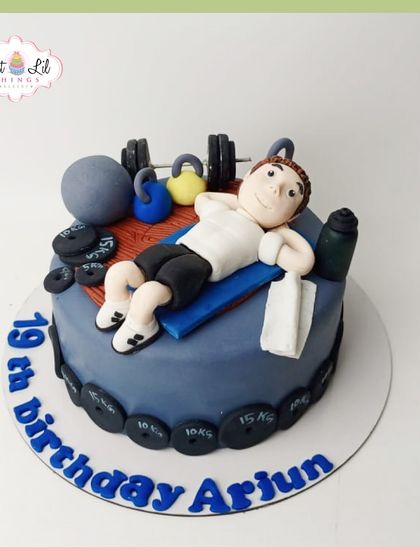 Fitness goals meet cake goals! A gym-themed cake for Arjun's 19th birthday, featuring a fondant figure relaxing after a workout, surrounded by weights.