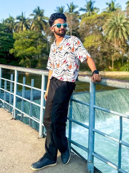 A duplicate of me posing on the bridge at Brindavan Gardens. The flowing water and palm trees make for a great photo opportunity.