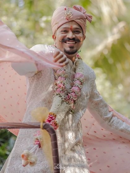 Another shot of the groom's dynamic entry, full of style and smiles.