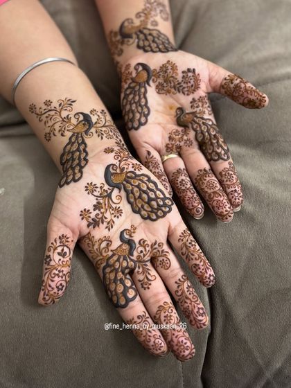 A scattered peacock design for Rakhi. This is a lighter, more modern take on traditional festival mehndi.