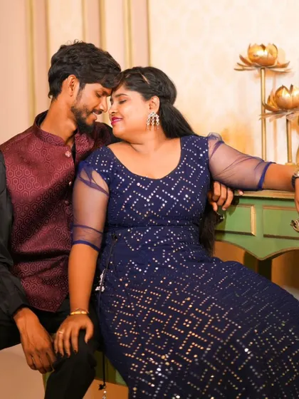 A close and intimate portrait of the couple. This shot highlights their connection and the beautiful details of the bride's dress and makeup.