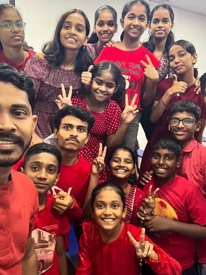 Thumbs up and peace signs from the students on Red day. The energy in the classroom was electric.