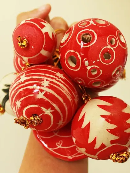 I love creating special pieces for festive seasons. This handful of hand-painted ceramic Christmas baubles shows the intricate and joyful patterns I can create to make your holiday decor personal and unique.