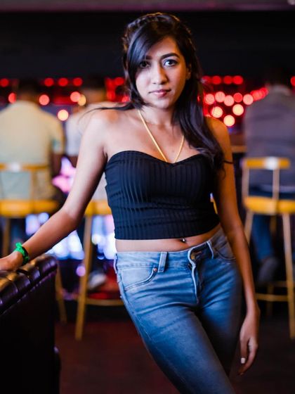 A guest posing at the bar.