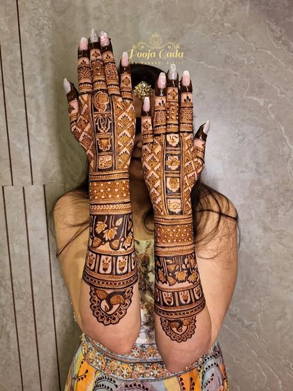 The back-hand design for my NRI bride from the US, featuring intricate patterns that complement her front-hand design beautifully.