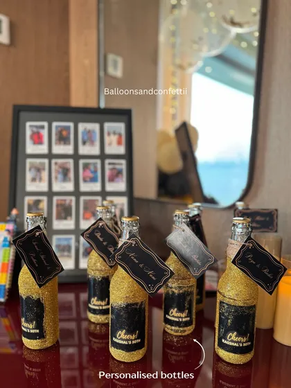 The little details make all the difference. For this 50th birthday, I created personalized, glitter-covered bottles as unique party favors.