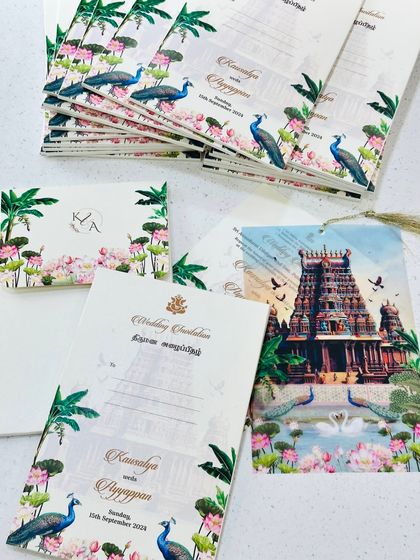A Tamil Nadu temple theme wedding invitation designed based on the bride's imagination. The card features a stunning illustration of the Sri Ranganathaswamy Temple and is printed in Tamil script.