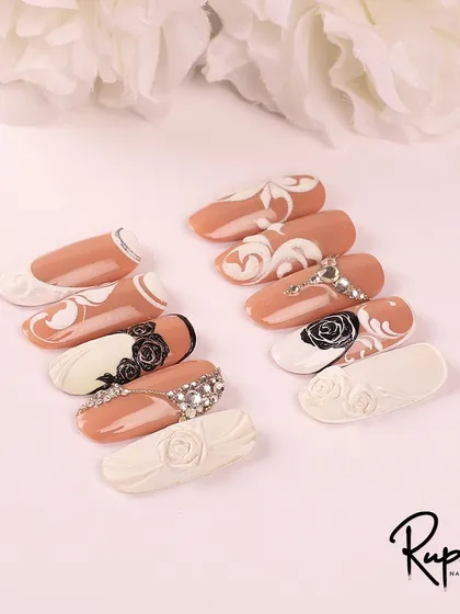 Another look at the bridal nail art designs, perfect for a classic wedding look.
