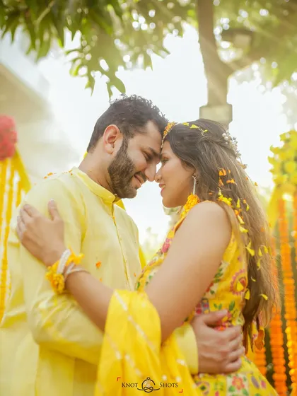 "Hello sunshine." This backlit shot of the couple during their haldi is filled with warmth and golden light, a perfect romantic portrait.