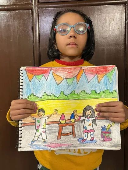 A vibrant Holi celebration captured on paper by a talented student. Art is a wonderful way for children to express the joy and color of our festivals.