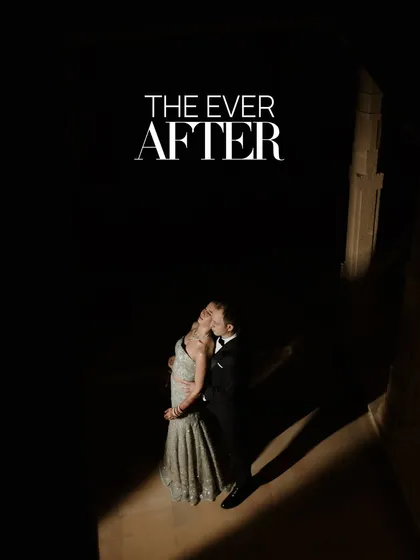 "The Ever After" begins here. A dramatic, high-contrast portrait within the stone corridors of Suryagarh, Jaisalmer. The single stream of light illuminates the couple, creating a powerful, movie-poster-like image that speaks of destiny and timeless love.