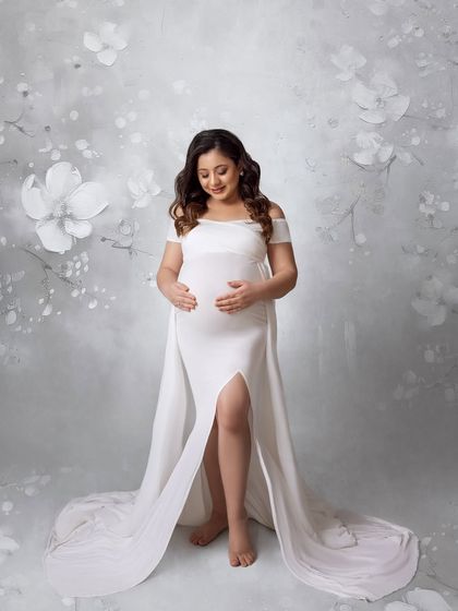 The same beautiful pose, but with a different floral background, showing how I can customize the final image to the client's taste.