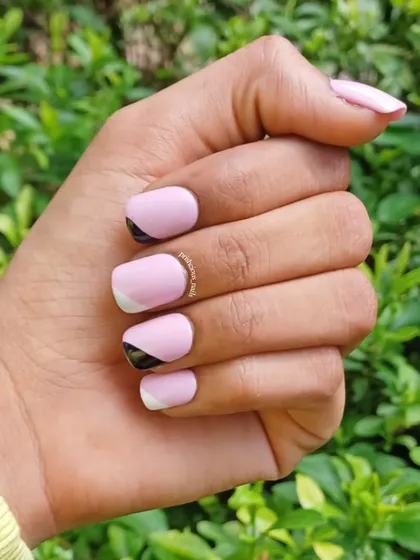 Another view of the geometric press-on nails, showing how they can give you a fun, unique manicure in minutes.