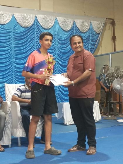 Shubam Trivedi with his trophy for being the Under 19 Boys singles Runner-Up at the Hospet state ranking tournament.