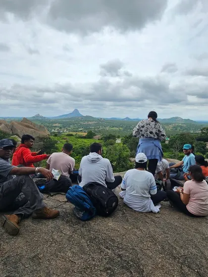 A group taking a break and enjoying the view during the Nijagal Betta trek. My one-day treks are beginner friendly and focus on enjoying nature.