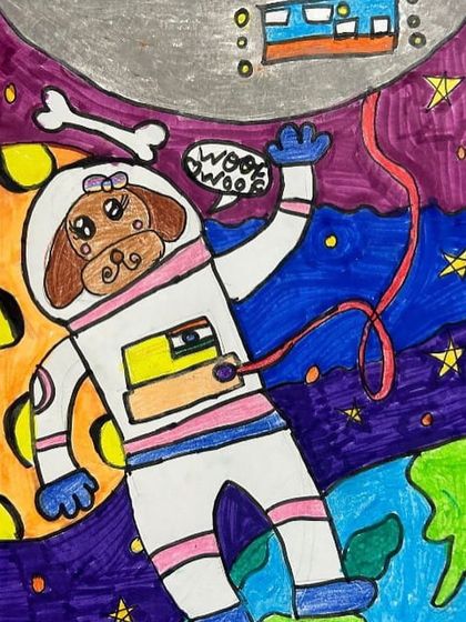 A dog in a spacesuit. Our lessons often combine different themes, like animals and space, to spark creative and unexpected ideas.