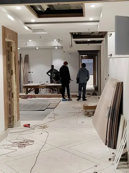 A view from the early stages of construction, showing the raw space and the initial framework taking shape. I am hands-on throughout this process to ensure every element is built to specification.