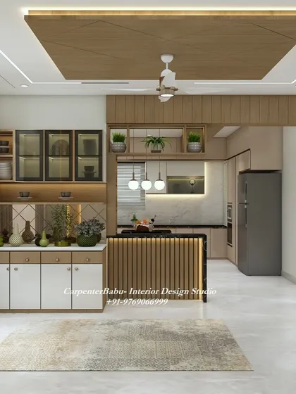 This image showcases an open kitchen with a breakfast bar and a beautiful crockery unit, all designed with warm wood tones and modern finishes.