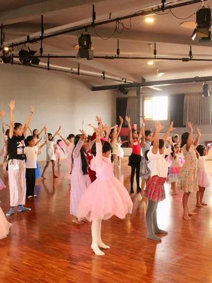 Students learning a group combination during the Nutcracker party. Even our parties are a chance to dance and learn together in a fun, festive setting.