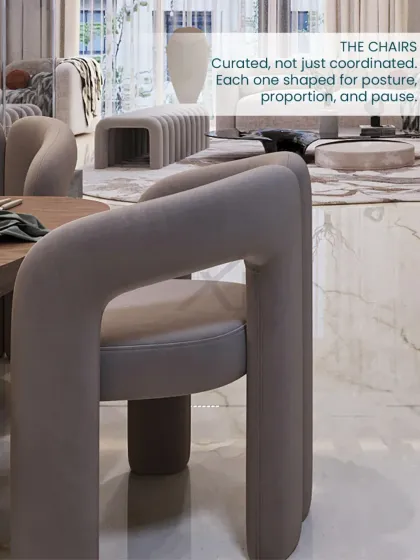 The dining chairs were curated for posture, proportion, and pause. Their unique shape adds a contemporary touch to the room.