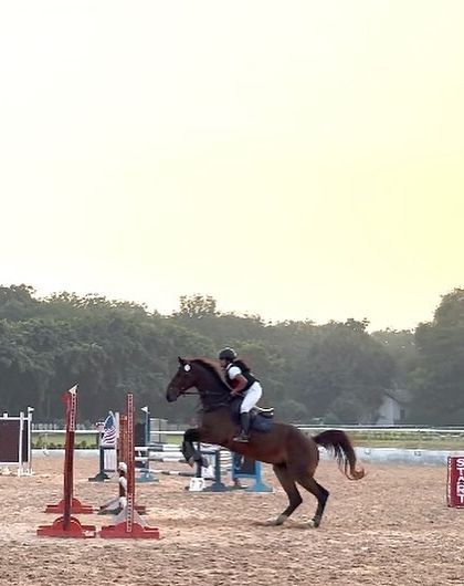 Another powerful jump from our young national qualifier, demonstrating excellent form and a strong partnership with her horse.
