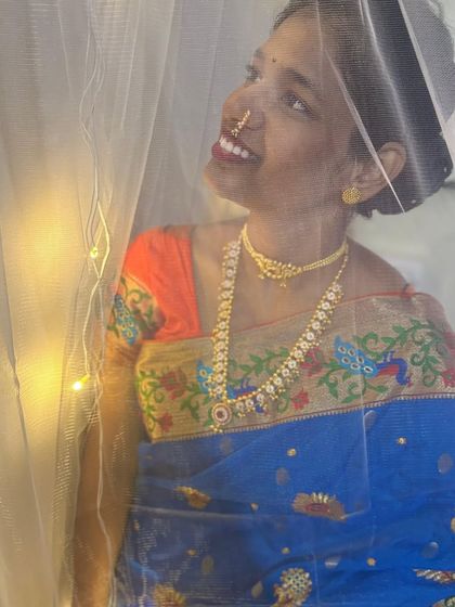 A joyful moment captured. This look features a simple choker and long necklace, showing that you can shine brightly even with more understated traditional pieces.