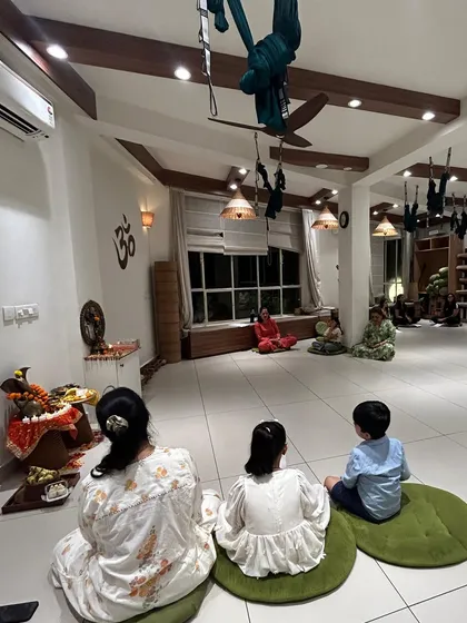 Our space is for everyone. Here, a family sits together during our Ganesh Chaturthi pooja, sharing a moment of devotion. We believe in celebrating our traditions together, creating memories and passing on our values to the next generation.