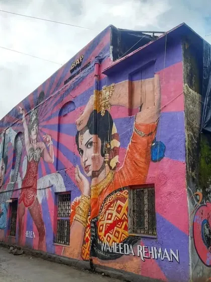 A vibrant mural by the Bollywood Art Project celebrating the dancing queens of classic Hindi cinema, Helen and Waheeda Rehman. The artwork captures the energy and grace of their iconic performances.