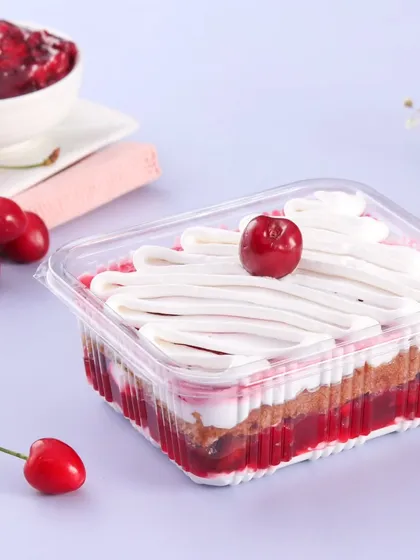 Our Vanilla Cherry dessert tub is a lighter, fruitier option. It layers vanilla sponge with a tangy cherry filling and fresh cream, topped with a single cherry for a simple, elegant finish.