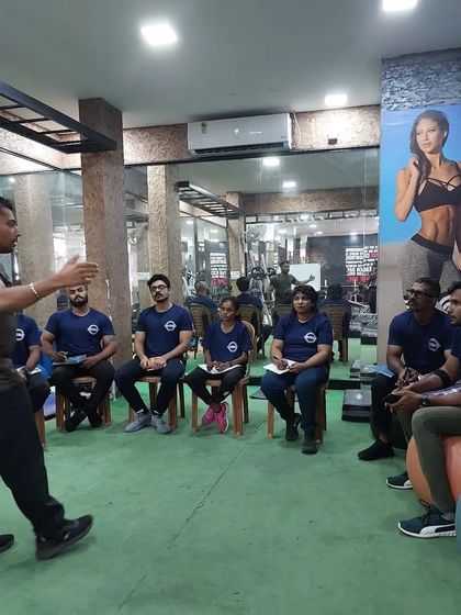 A classroom session in progress. Here, I am explaining the theoretical principles of program design to a group of aspiring trainers. A strong scientific foundation is what separates a good trainer from a great one.