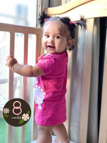 Another shot from her 8-month milestone. Her smile and pigtails are just the cutest.