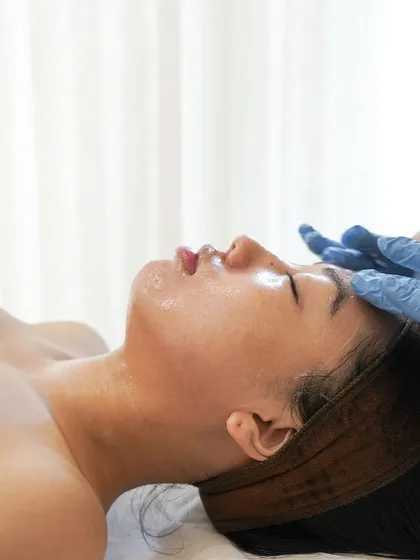 POV: You've found your dream facial experience. This client is in a state of deep relaxation during a facial massage, a key part of my signature treatments.